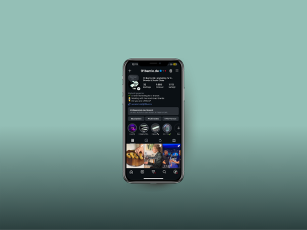 A phone showing the 91barrio.de Instagram account